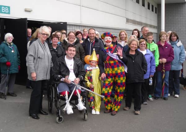 Fundraisers prepare to take part in the Doncaster Cancer Detection Trust's Mid-Summer Walk, at Keepmoat Stadium and Lakeside.