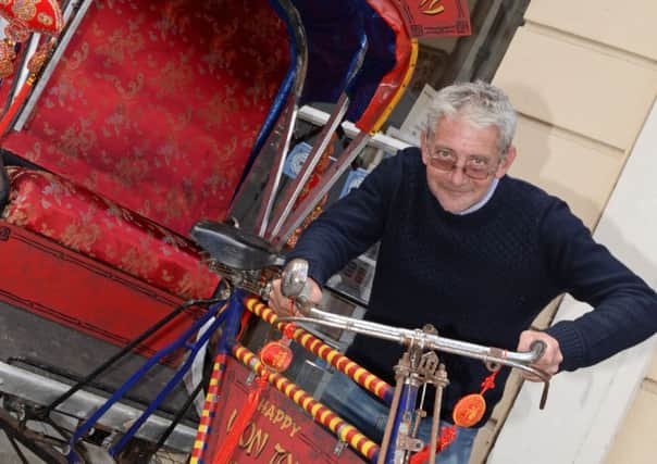 Colin Joy, Doncaster Tourism manager, pictured with a Rickshaw outside the Doncaster Tourism Information Centre. Picture: Marie Caley NDFP Rickshaw MC 3