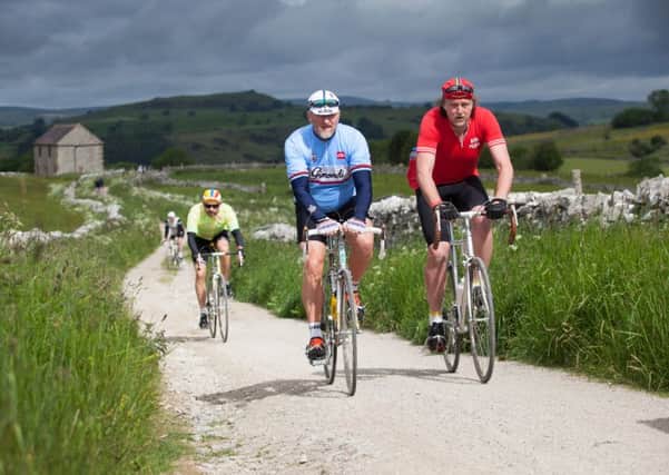 Cyclists in last years Ride of a Lifetime climbing out of Hartington  www.fstoppress.com.