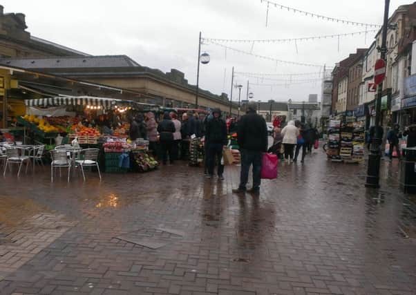 Shoppers at Doncaster Markets on Christmas Eve 2015. Traders say even though it looks busy, there are less people than there has been previously and business is the worst it has been for many years.