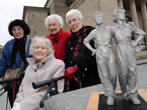 Women of Steel with a maquette of their statue which will be unveiled outside outside Sheffield City Hall on Friday, June 17, at 11.30am.