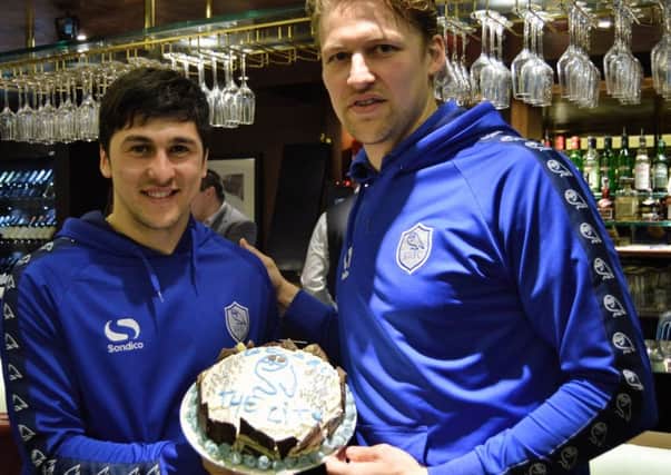 Supporting the Time For Tea campaign Shefield Wednesday players (left) Fernando Forestieri and Glenn Loovens