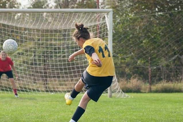 Female footballers' goal not shared by dads