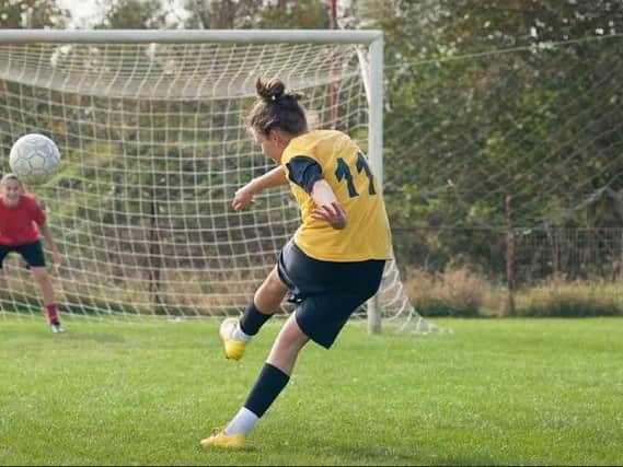 Female footballers' goal not shared by dads
