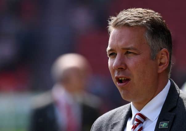 Darren Ferguson says he is happy with the size of his squad at 19 senior players