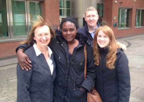 Linda Okungbowa with members of the Ark church outside Sheffield Crown Court