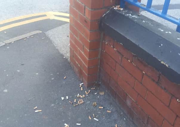 A picture taken by Natasha Johnson supposedly showing discarded cigarette ends outside Montagu Hospital.