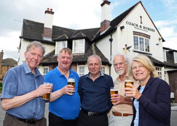 Coach and Horses landlord Shane Smith (centre), pictured with CAMRA members L-r Jim Sambrooks, Gordon Sharpe, Doncaster CAMRA Pubs Protection Officer, Tony Wrigglesworth and Jackie Gladden. Picture: Marie Caley NDFP CAMRA MC 1