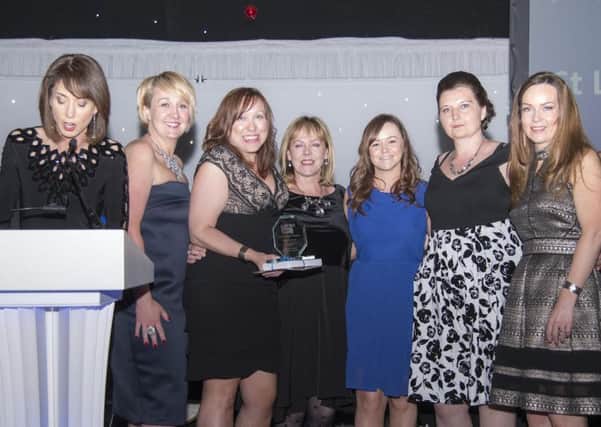 Members of staff from St Leger Homes with their award.