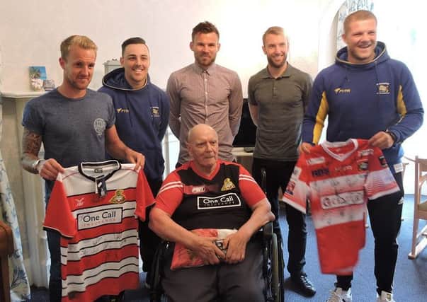 (l-r) James Coppinger, Jordie Hedges, Andy Butler, Andy Williams and Connor Scott visit Rovers and Dons fan Les Lightfoot.
