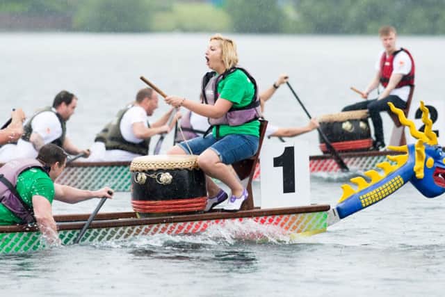 Dragon Boat Racing in the rain at Lakeside Doncaster