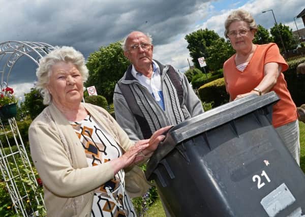 Barbara and Douglas Hill and neighbour Norma Hill, of Hatfield Lane, Armthorpe, have only had their Black bins emptied three times since Christmas. Picture: Marie Caley NDFP Missed Bins MC 1