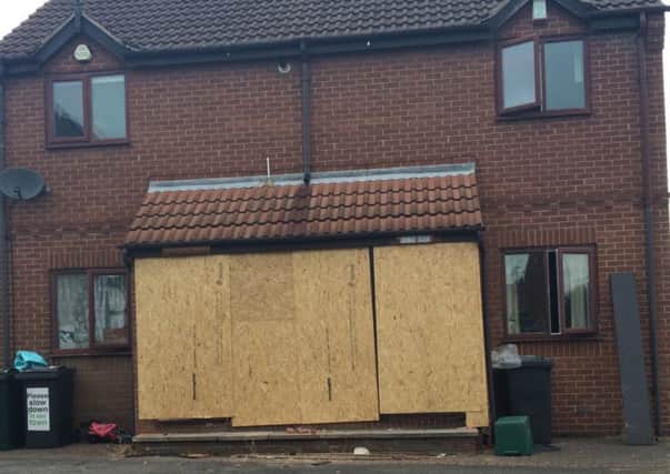 The boarded up properties following a car smash  in Silver Street, Stainforth