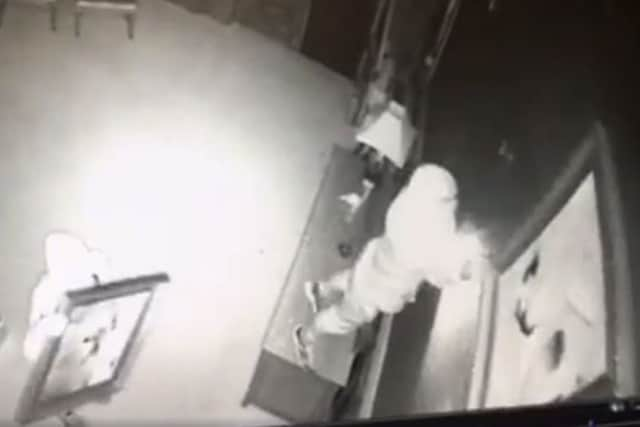 CCTV still of a break-in at Rossington Hall, Doncaster in which several paintings were stolen