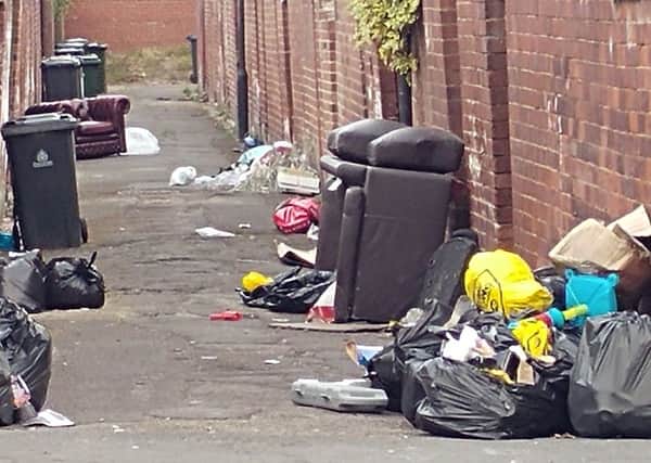 Rubbish dumped in an alleyway near Littlemoor Lane, Balby