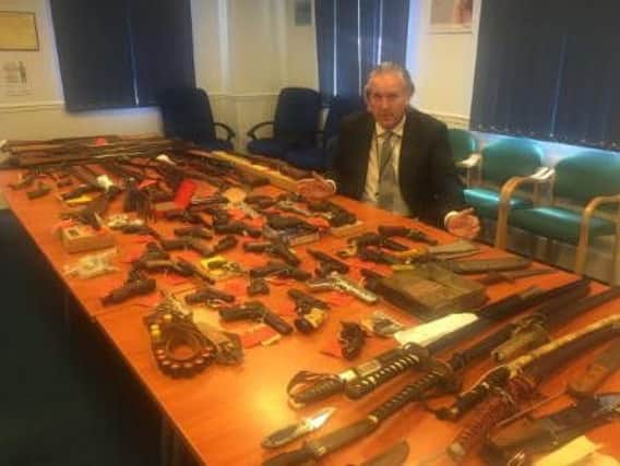 Arms amnesty leader Detective Chief Inspector Steve Whittaker with the haul