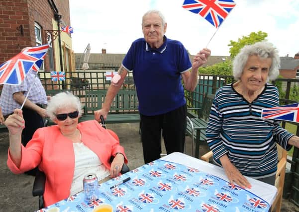 A 1940's garden party was held at Brookwood Car Home in Doncaster. Pictured are residents Elsie Price, Harry Woodward, and Joyce Matthews.