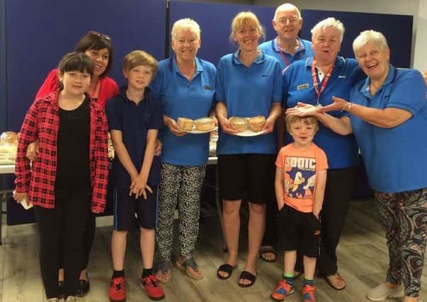 Thorne and Moorends Community hub volunteers welsome Toping Pie Company donations