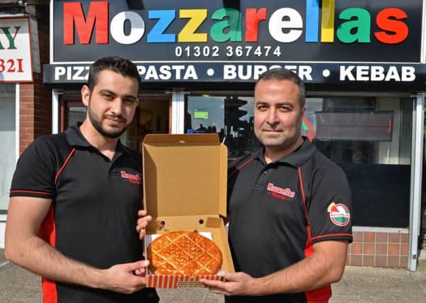 Erkan Kinal, Owner (right), pictured with Atanas Borisov, outside Mozzarellas, Intake. Picture: Marie Caley NDFP Mozzarellas MC 1