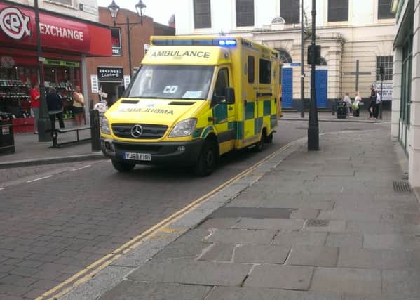 An ambulance is seen on Priory Place, Doncaster, after a male pedestrian was involved in a collision with a taxi on the corner of Printing Office Street and Priory Place. Paramedics were seen attending to the man.
