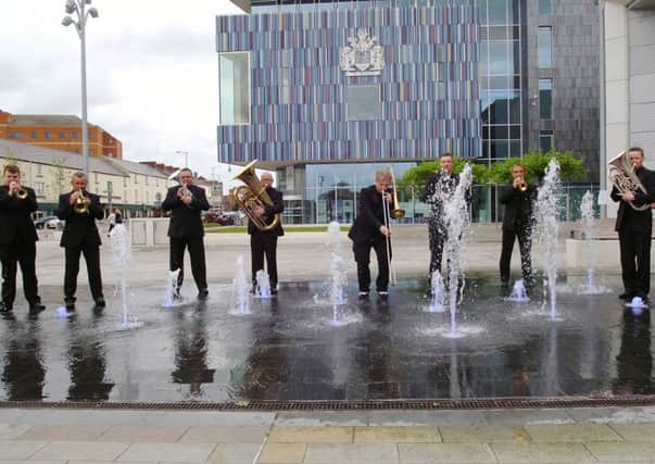 DNweekeND in Doncaster.  The Brass Players, based in Carcroft entertain in Sir Nigel Gresley Square.   Picture: Malcolm Billingham