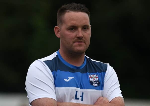 Rossington Main manager Lee Holmes