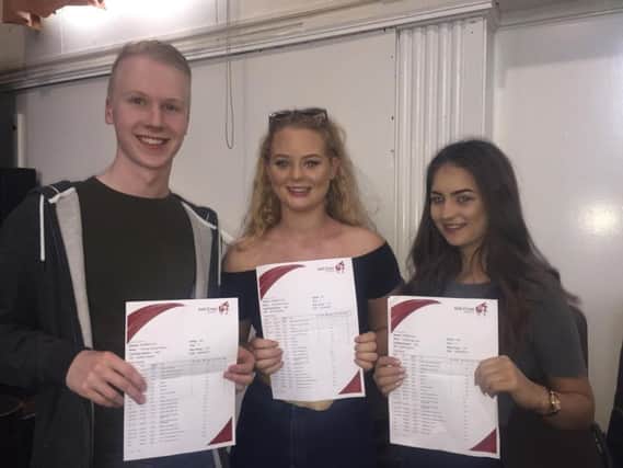 Hall Cross pupils Tom Stafford, Rosie Jenkins and Charlotte Lane, all aged 16.
