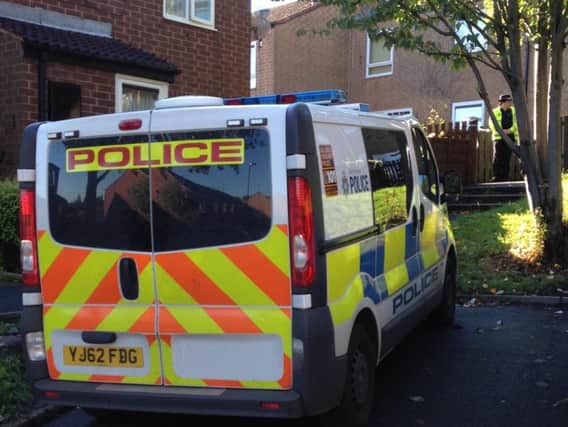 A police van outside the property in Walkley.