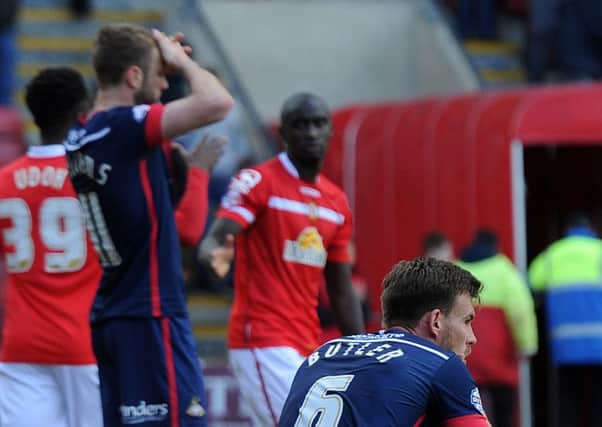 Andy Butler and Andy Williams show their dejection at Crewe in April