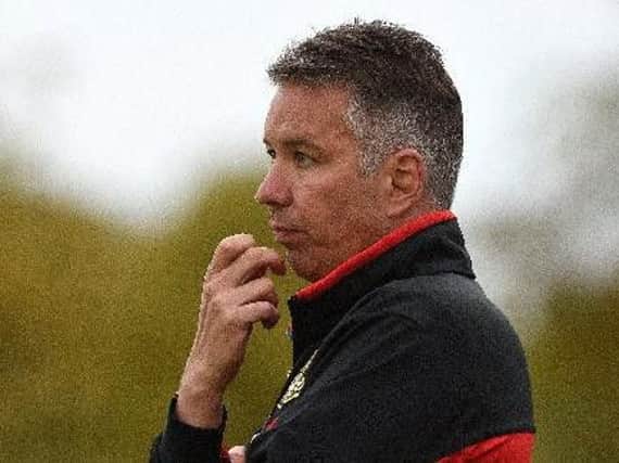 Darren Ferguson is trying to sign a 'different type of striker' before tonight's transfer deadline
