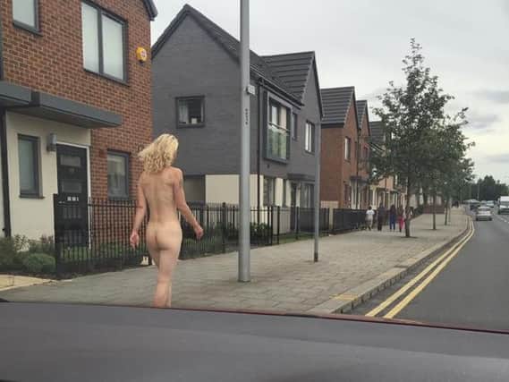The naked woman on College Road. (Photo: Richard Robinson).