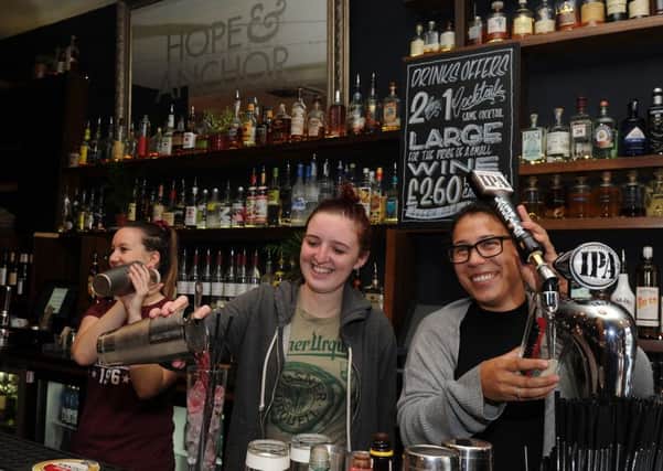 (l-r) Staff Zoe Burgess, Tania Mcwha and Derrin Rainstrick at the Hope and Anchor, West One. Picture: Andrew Roe