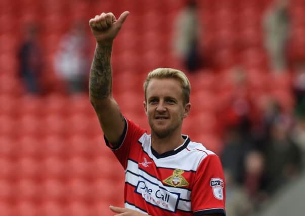 James Coppinger gives the thumbs up to supporters following the win over Newport County.