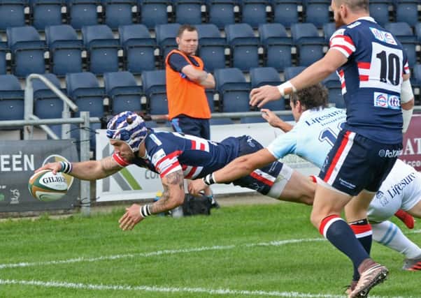 Dougie Flockhart scores a try for Knights.