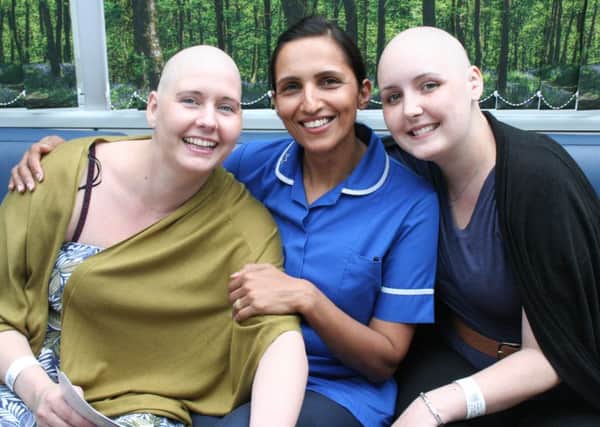 Cancer patients Tania and Lindsey with nurse Kam Singh