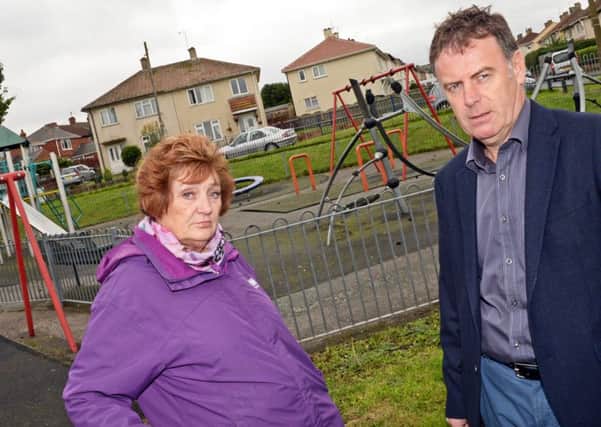 The Mayor of Edlington Joan Briggs and Simon Oldham, Town Clerk, pictured by the playground on the Edlington Recreation ground which has had to be closed due to continued vandalism. Picture: Marie Caley NDFP Playground MC 1