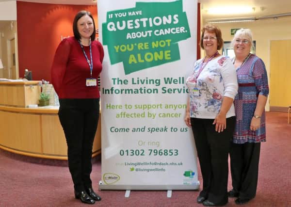 Lynne Hill, second right, with the team from the Living Well Information and Support Service.