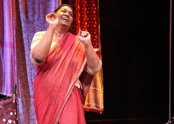 Rani Moorthy playing one of five character in her solo show, Whose Sari Now?