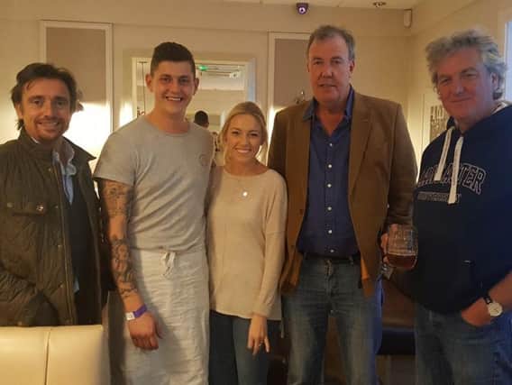 Richard Hammond, Jeremy Clarkson and James May with staff at Mister Chips in Whitby.