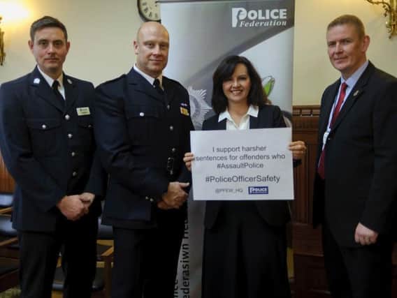 L-R: PC Craig Gallant (West Yorkshire Police), Nick Smart (Chairman, West Yorkshire Police Federation), Caroline Flint, Calum Macleod (Vice-Chairman, Police Federation of England and Wales).