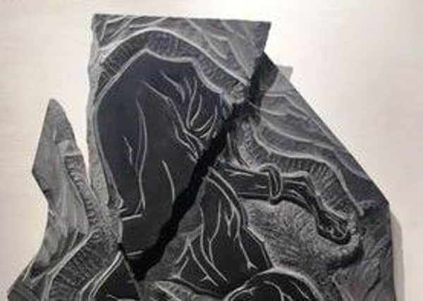 Slate carving by Vincent Roff.