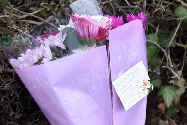 A floral tribute left at the scene