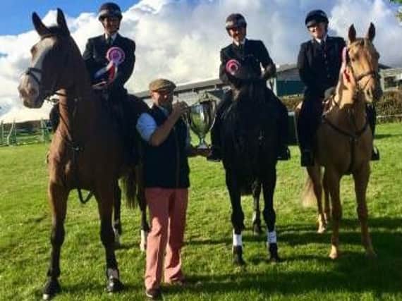 Three-mendous South Yorkshire Police Saddle Club staff and steeds
