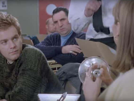 Andy (Ewan McGregor) and Harry (Jim Carter) listen to the surprising new addition to the band, Gloria (Tara Fitzgerald). Credit: Channel Four Films/ Miramax / Prominent Features
