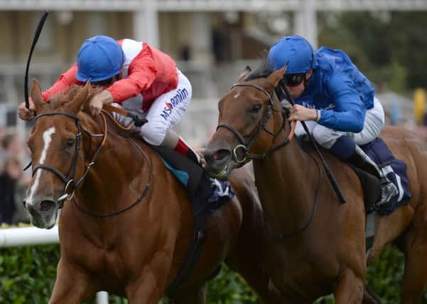 Spangled ridden by Andrea Atzeni (left) beats Mise En Rose ridden by William Buick to win the Japan Racing Association Sceptre Stakes during day three of the 2016 Ladbrokes St Leger Festival at Doncaster Racecourse, Doncaster. PRESS ASSOCIATION Photo. Picture date: Friday September 9, 2016. See PA story RACING Doncaster. Photo credit should read: Anna Gowthorpe/PA Wire