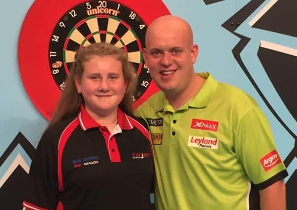 Beau Graves, pictured with world number one Michael van Gerwen.