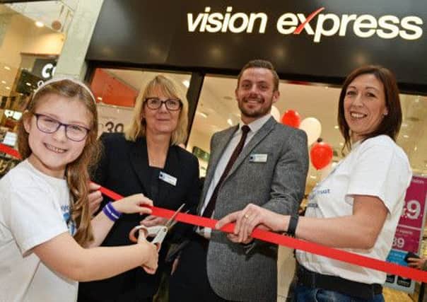 (From left) Olivia Harrison, Vision Express Doncaster store manager Margaret Maughan, regional manager Jamie McPherson and Olivias mum Jane Harrison