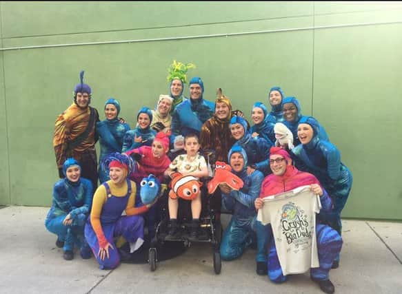 Jack Kirsopp, aged 10, of Cantley, on a once-in-a-lifetime holiday to Disney World in Florida. He is pictured meeting Mickey Mouse, who was able to sign to him. He is pictured with the cast of the live action version of 'Finding Nemo' - his favourite Disney film.