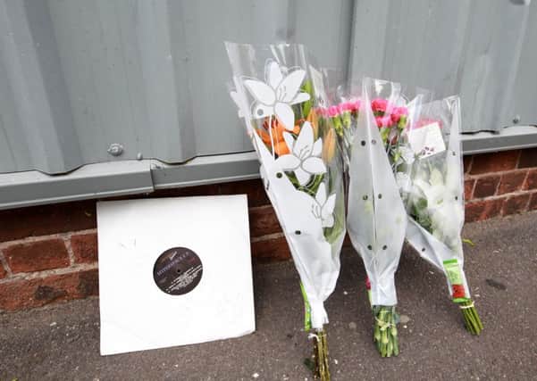 Floral tributes to DJ James Vorny outside The Warehouse in Doncaster. The 35-year-old well known DJ died on Monday. Photo: Chris Etchells