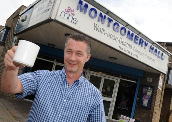 Paul Murray, of Montgomery Hall, Wath holds up a cup of coffee which is on offer. Picture: Andrew Roe